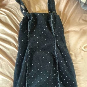 gently worn black ribbed polka dot dress